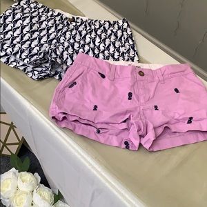 Two old navy shorts together